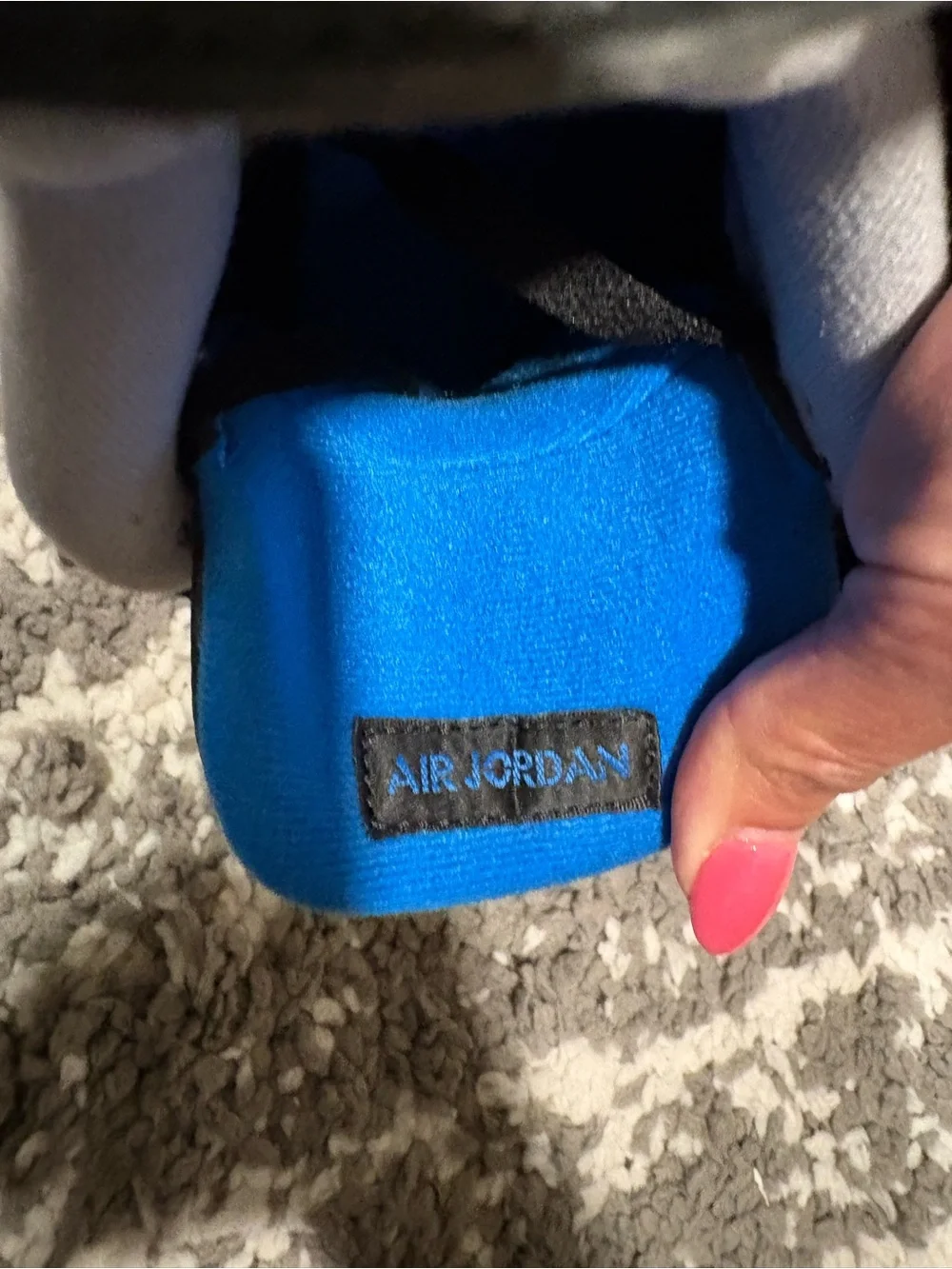 Nike Kids Black Sneakers with Blue Accents